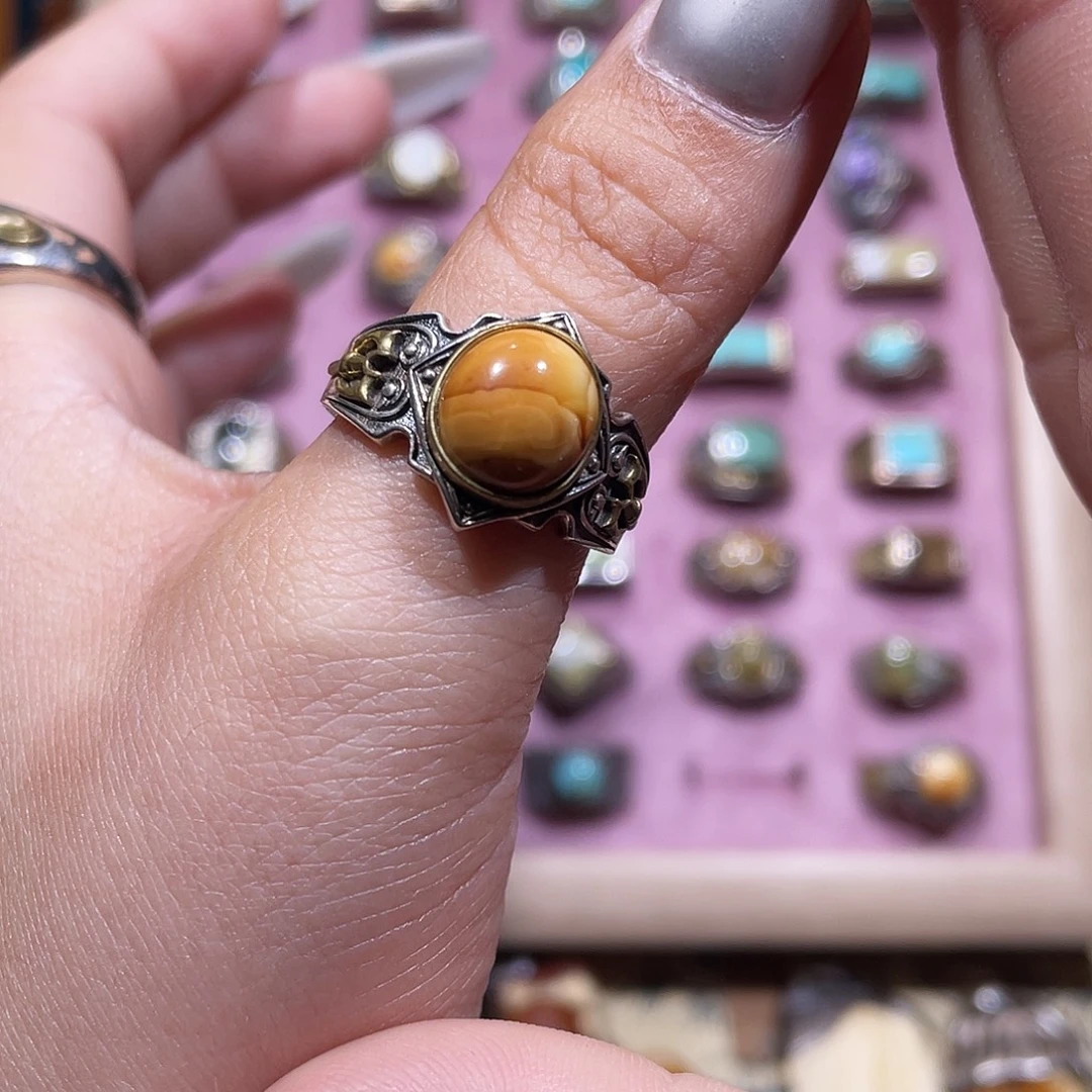 徐***呵琥珀银S925镶嵌戒指