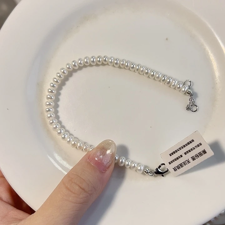 叫***猴银S925镶嵌淡水珍珠设计款的珠宝首饰