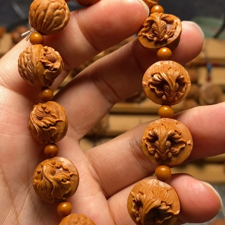 桃核手工雕刻金鱼手串