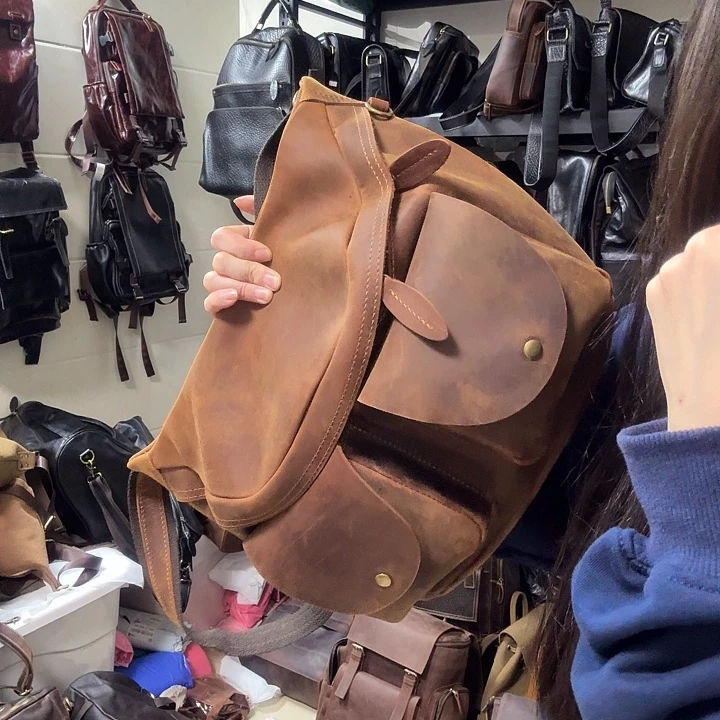 头层牛皮疯马皮斜挎包