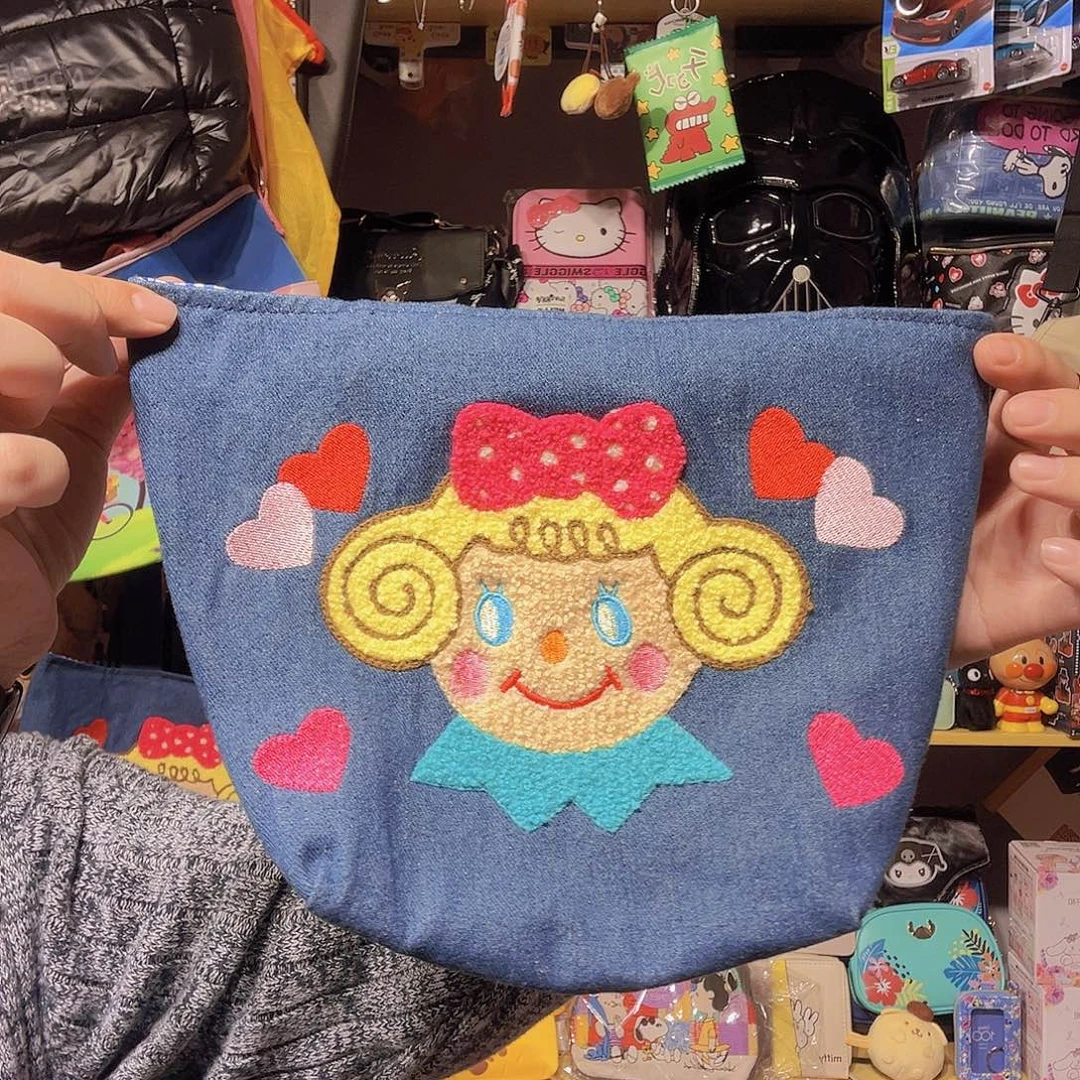 织物卷发女孩手提