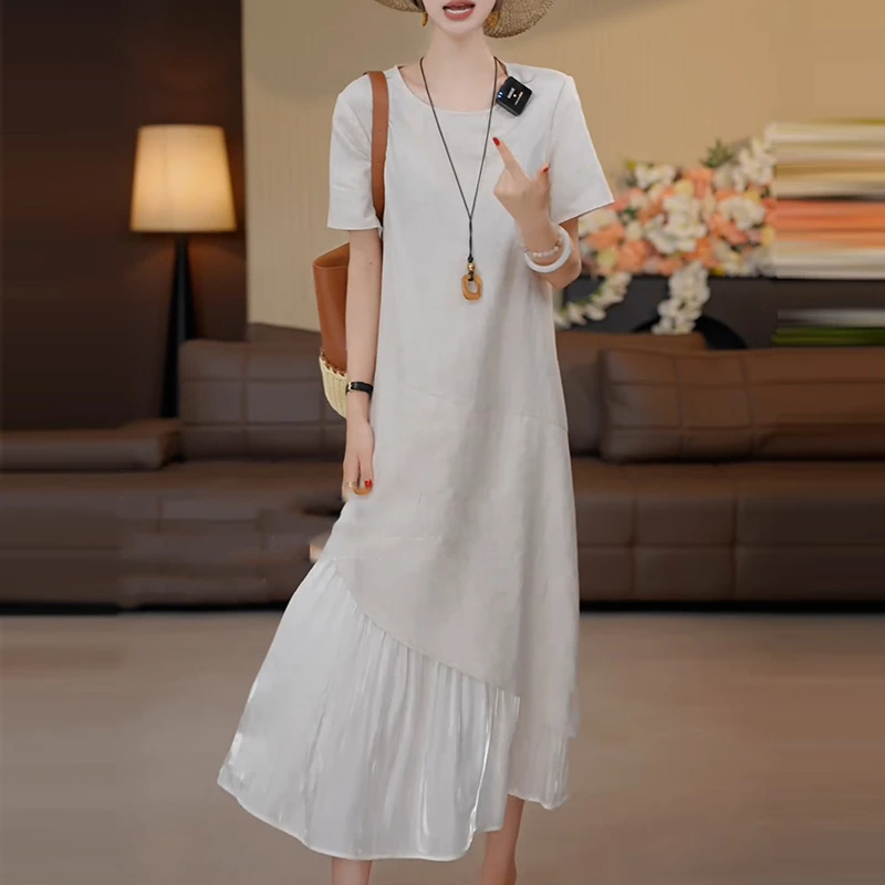 2025夏季新款短袖连衣裙女拼接设计感小众宽松简约风显瘦时尚长裙