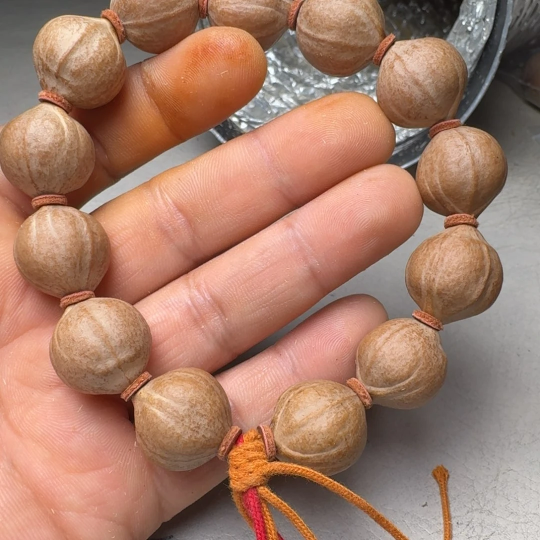 胡***、橄榄核手串橄榄核