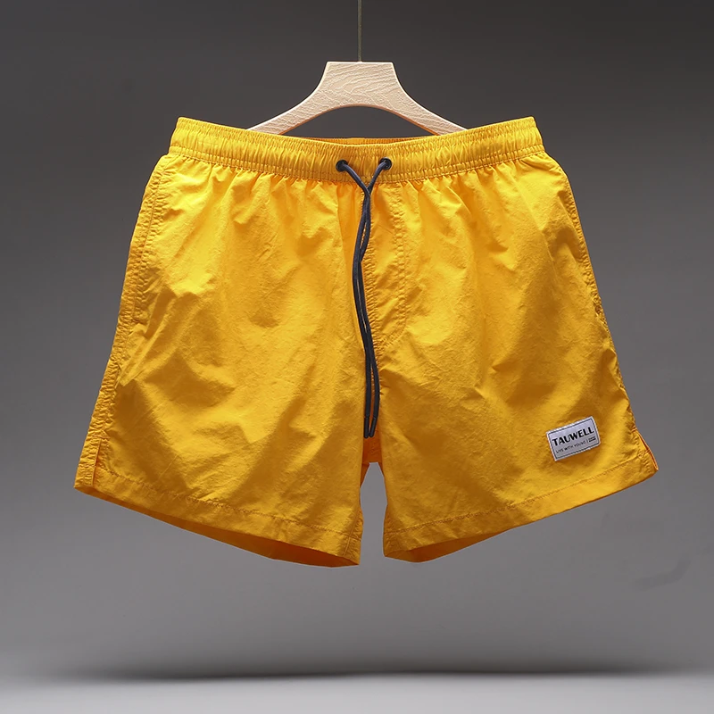 速干多巴胺泳裤夏季新款宽松大码沙滩裤纯色外穿冰丝速干短裤男士