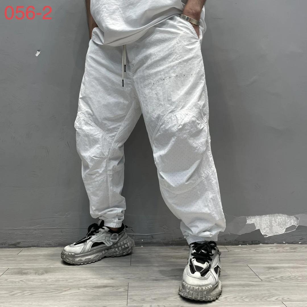 A056夏季新款薄款日系工装风透气户外冲孔设计空调裤弯刀休闲裤