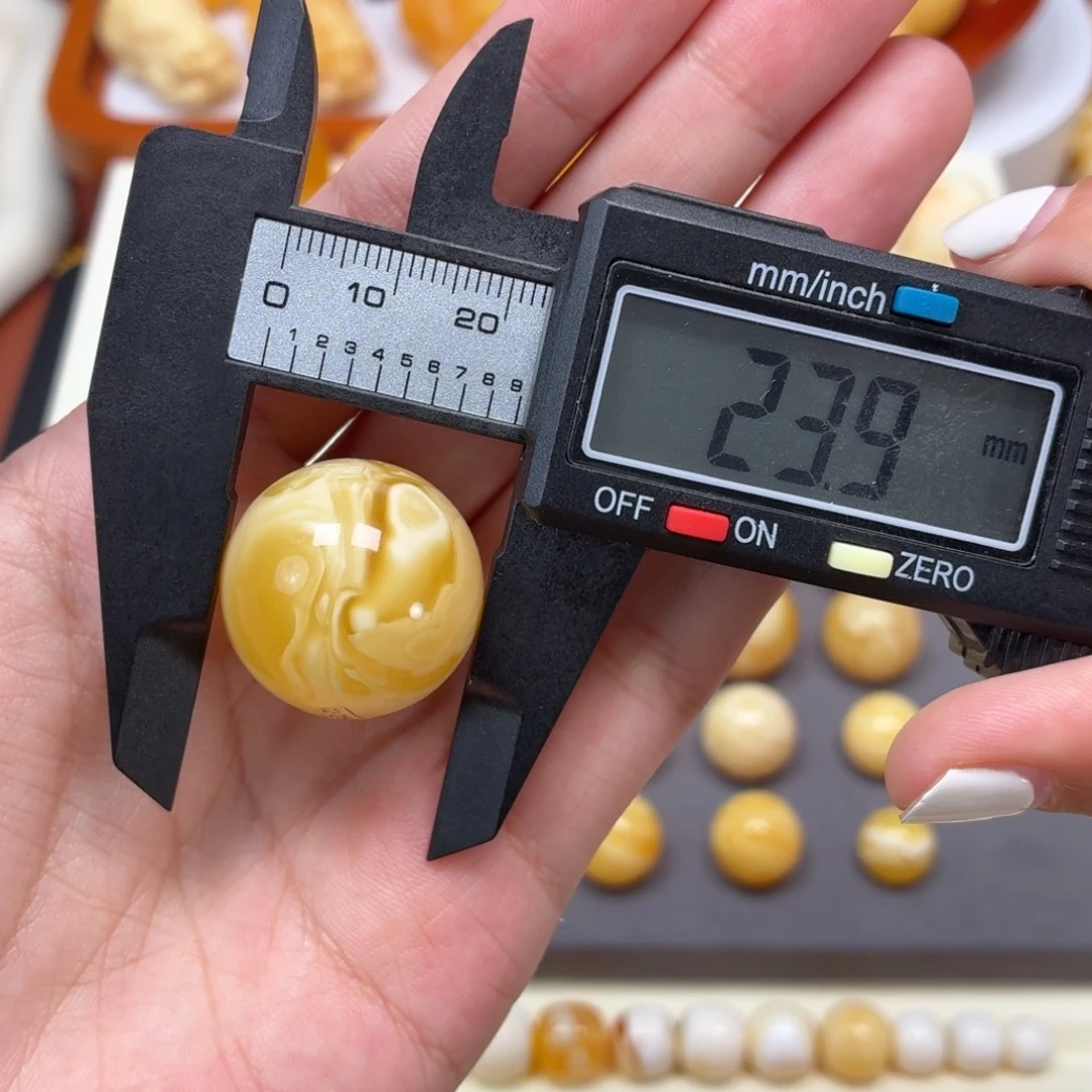 琥珀未镶嵌珠宝奇石俄料浓蜡溶洞太极圆珠23.8mm