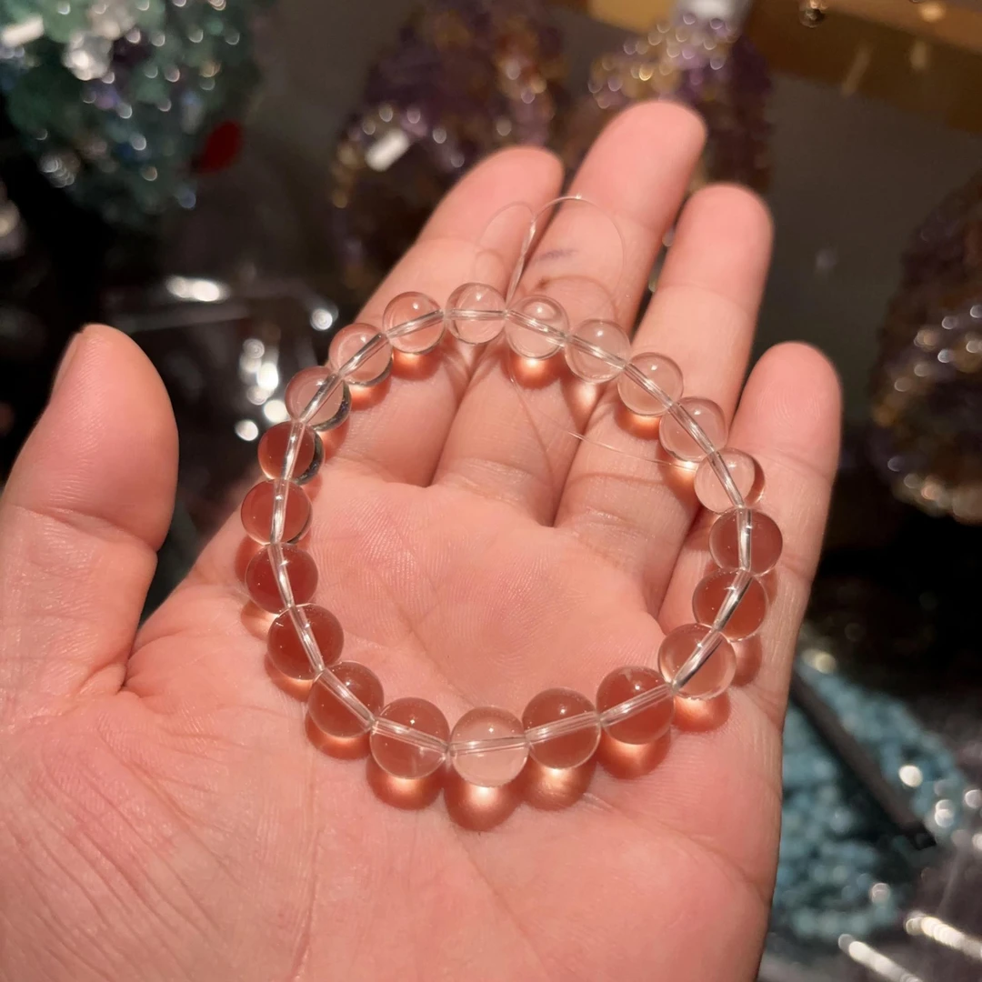 E27高级白透卡9手链