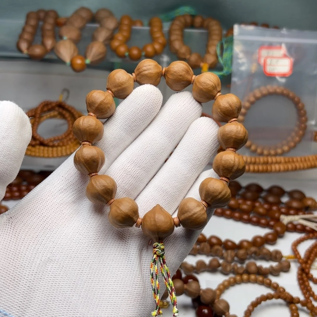 橄榄核吊坠1.65蜜桃手串