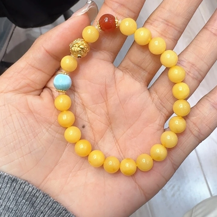 蜜蜡手串未镶嵌四***?