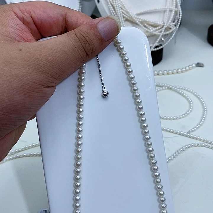 奶****颈饰银S925镶嵌淡水珍珠