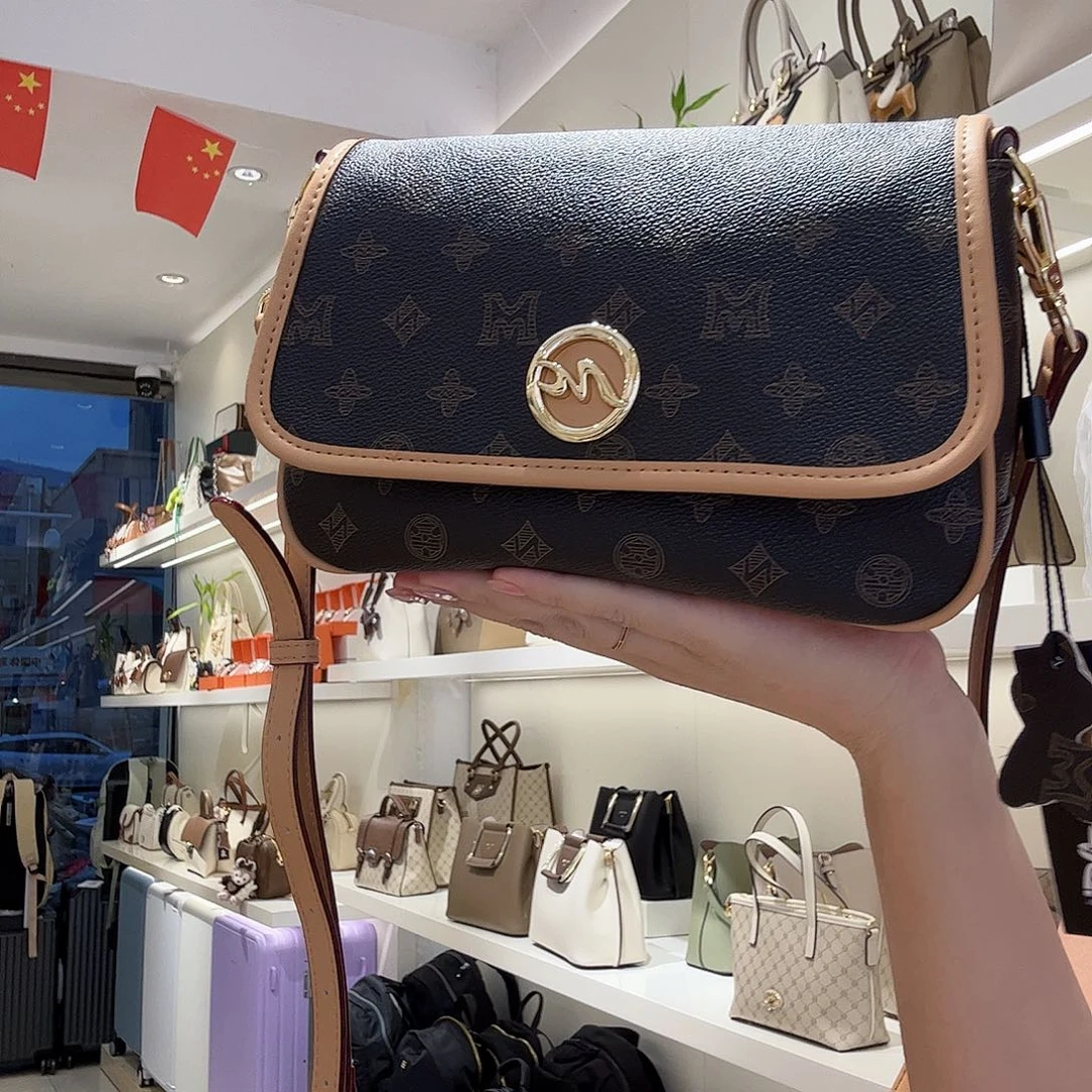 PVC稻草人女包单肩斜挎包