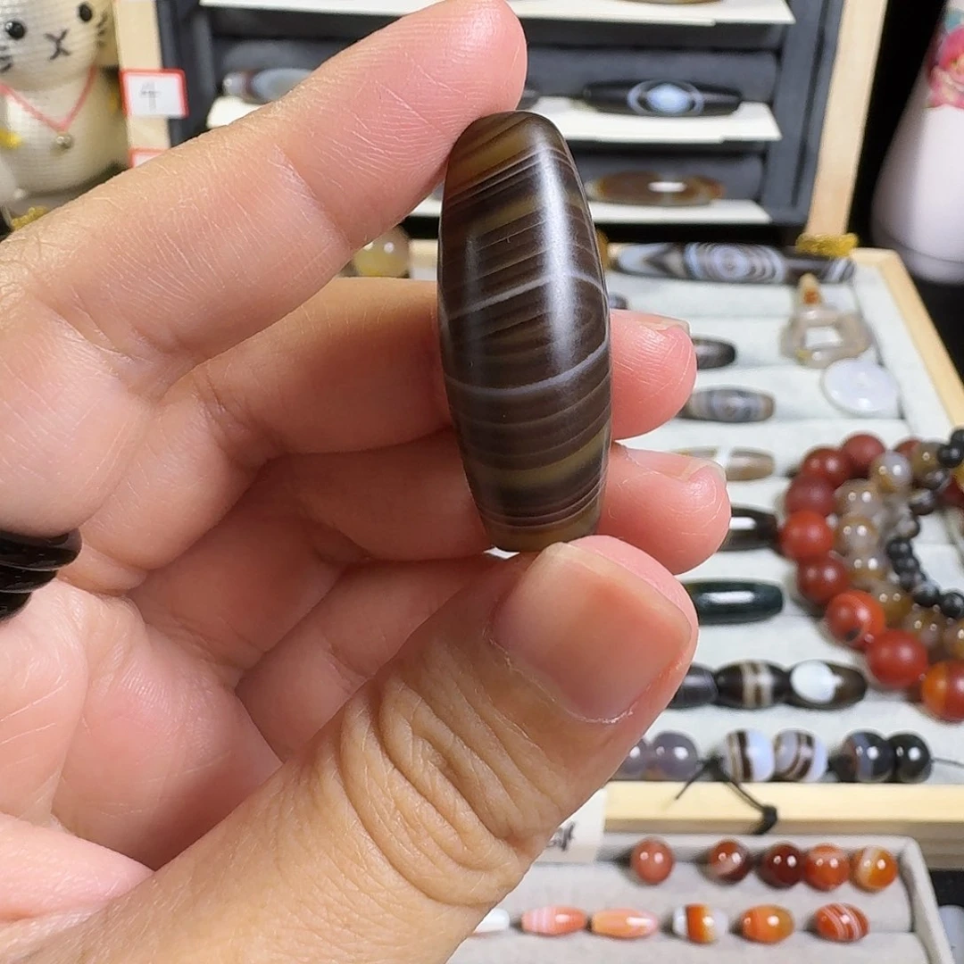 咖色带眼小桶珠啦啦