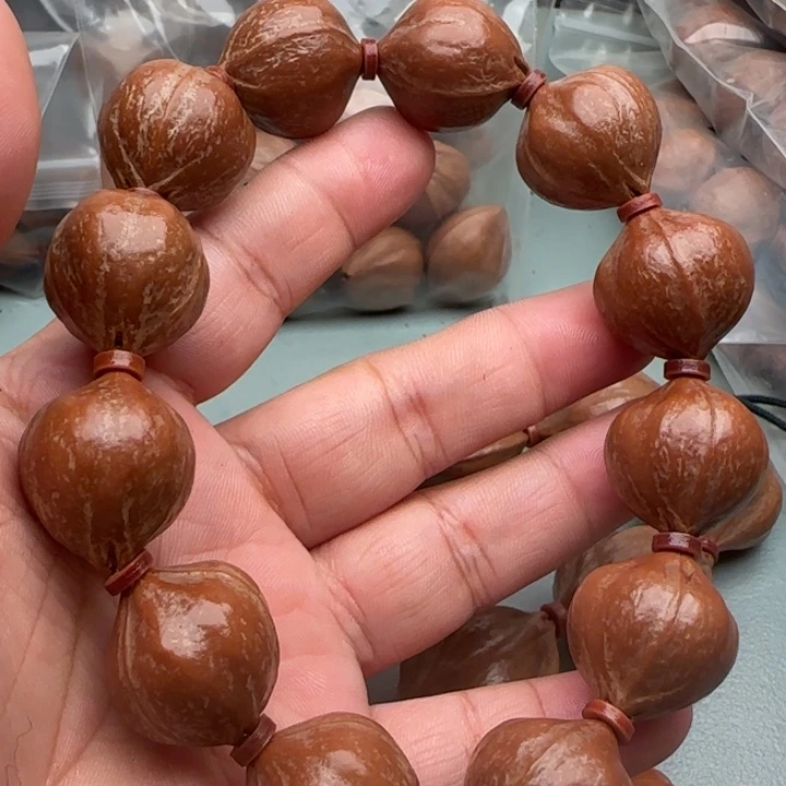 逍***客手串橄榄核橄榄核原皮铁核