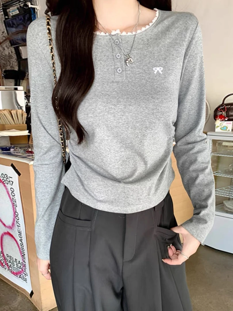 韩版花边拼接圆领纽扣T恤女春季2025新款假两件长袖打底修身上衣