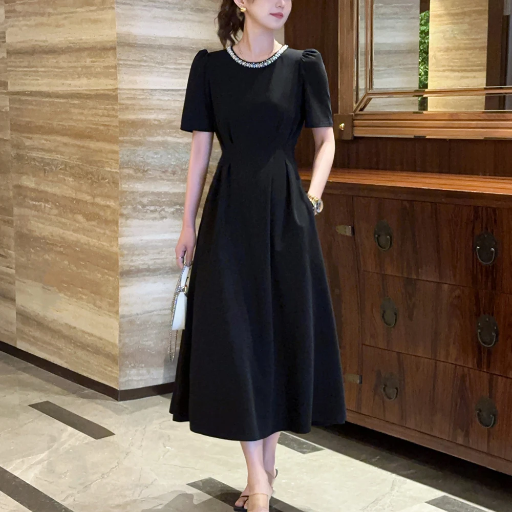 2025年珍珠黑色短袖连衣裙子女新款赫本风小个子a字法式长裙气质