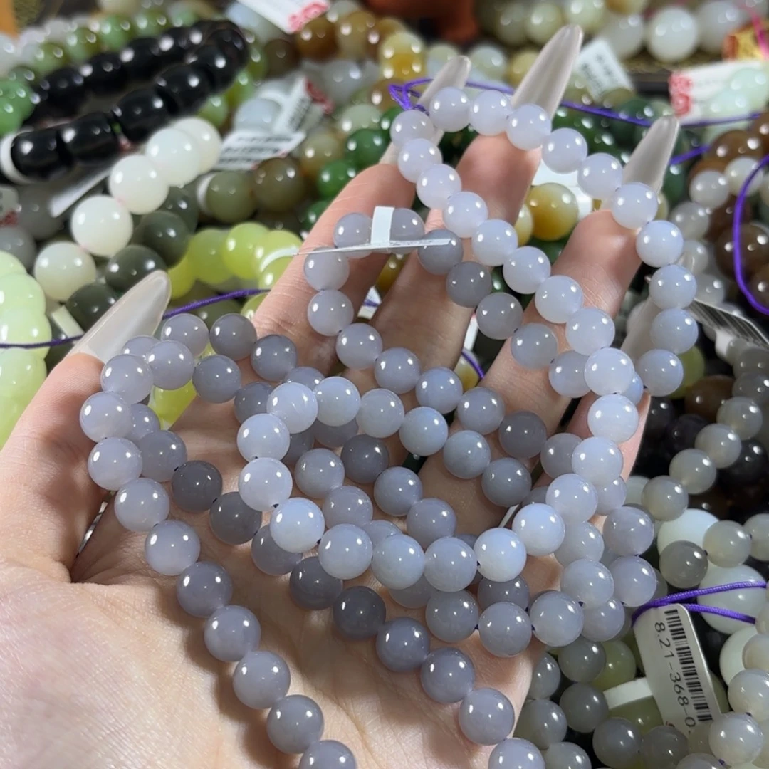 张***墨和田玉未镶嵌手链拍3发1。355