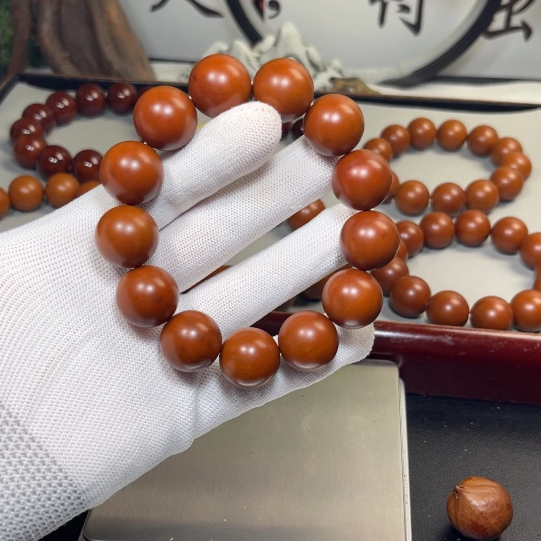 蔡***透橄榄核吊坠1.8树王铁核全品小孔