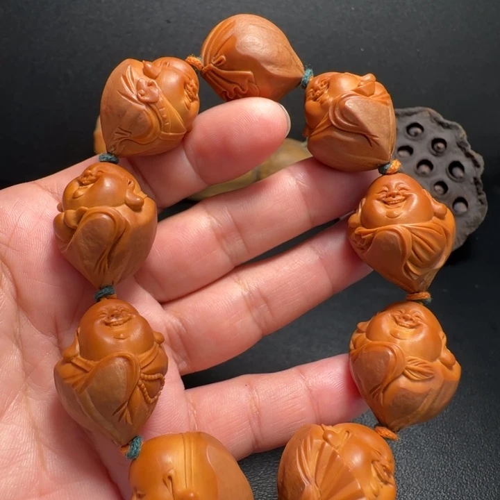 手串橄榄核包衣弥勒