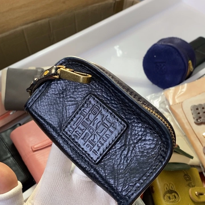 头层牛皮墨蓝色钥匙包瑕疵