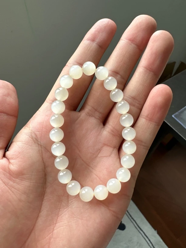 天然和田玉卡8猫眼手串 蜂蜜水