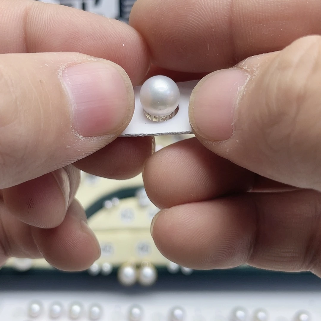 爱***瑄淡水珍珠银S925镶嵌耳饰