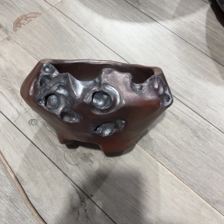 维***尼紫砂花盆宜兴紫砂工艺厂。