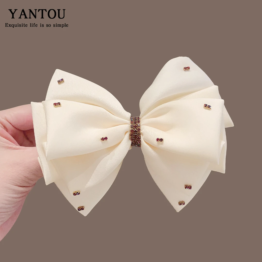 韩系白色蝴蝶结发夹女高端2025新款后脑勺半扎发弹簧发夹头饰