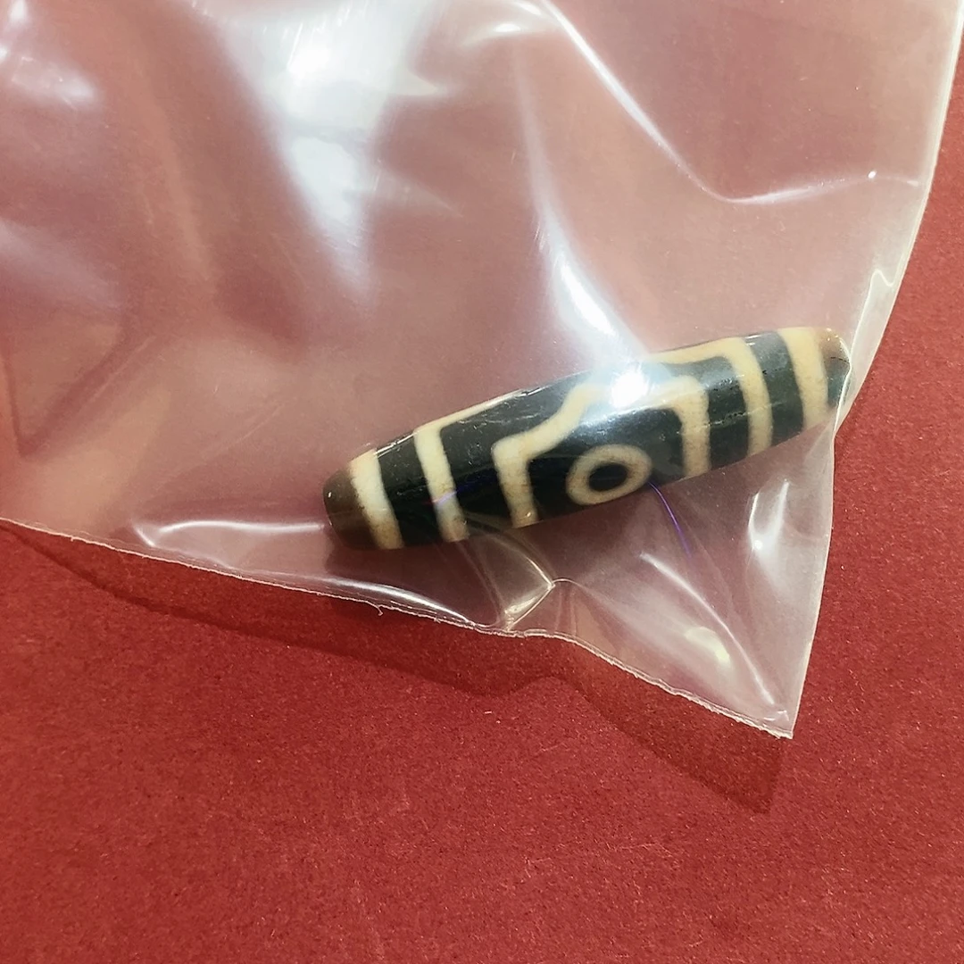 喆***喆玛瑙/玉髓（覆膜）颈饰未镶嵌行运无覆膜三眼