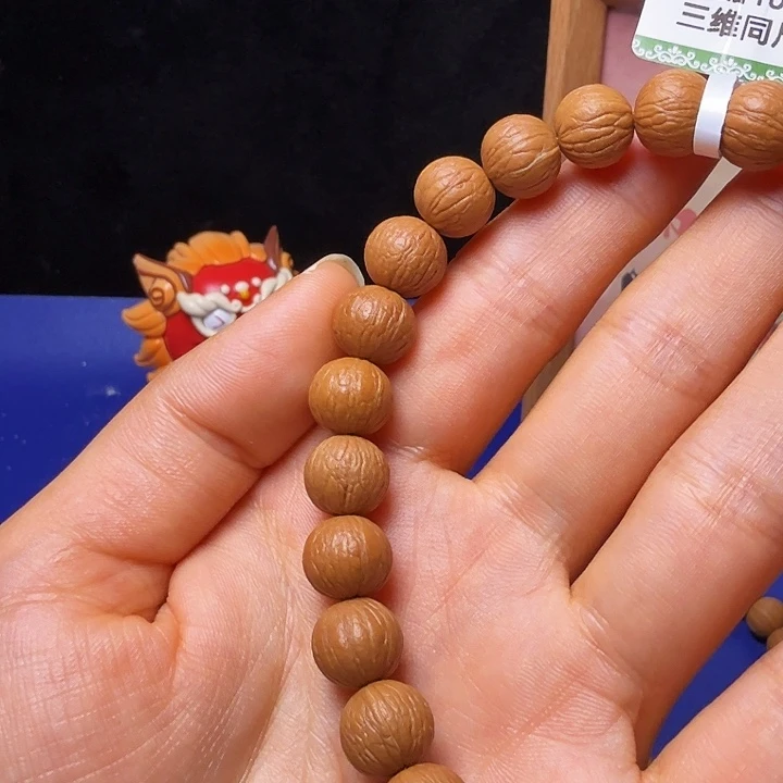 @***～猴头核桃吊坠凤羽