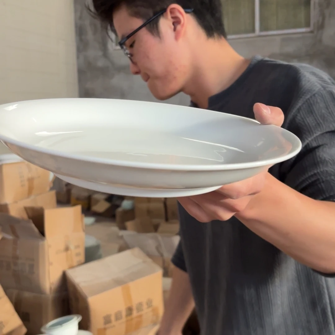 10英寸高白泥深窝盘2只微瑕