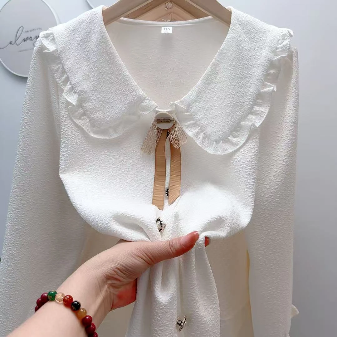 219娃娃领蝴蝶结九分袖衬衫女立体提花法式套头款上衣