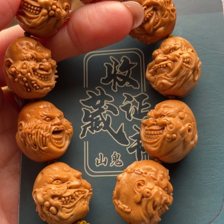 等***临橄榄核吊坠橄榄核