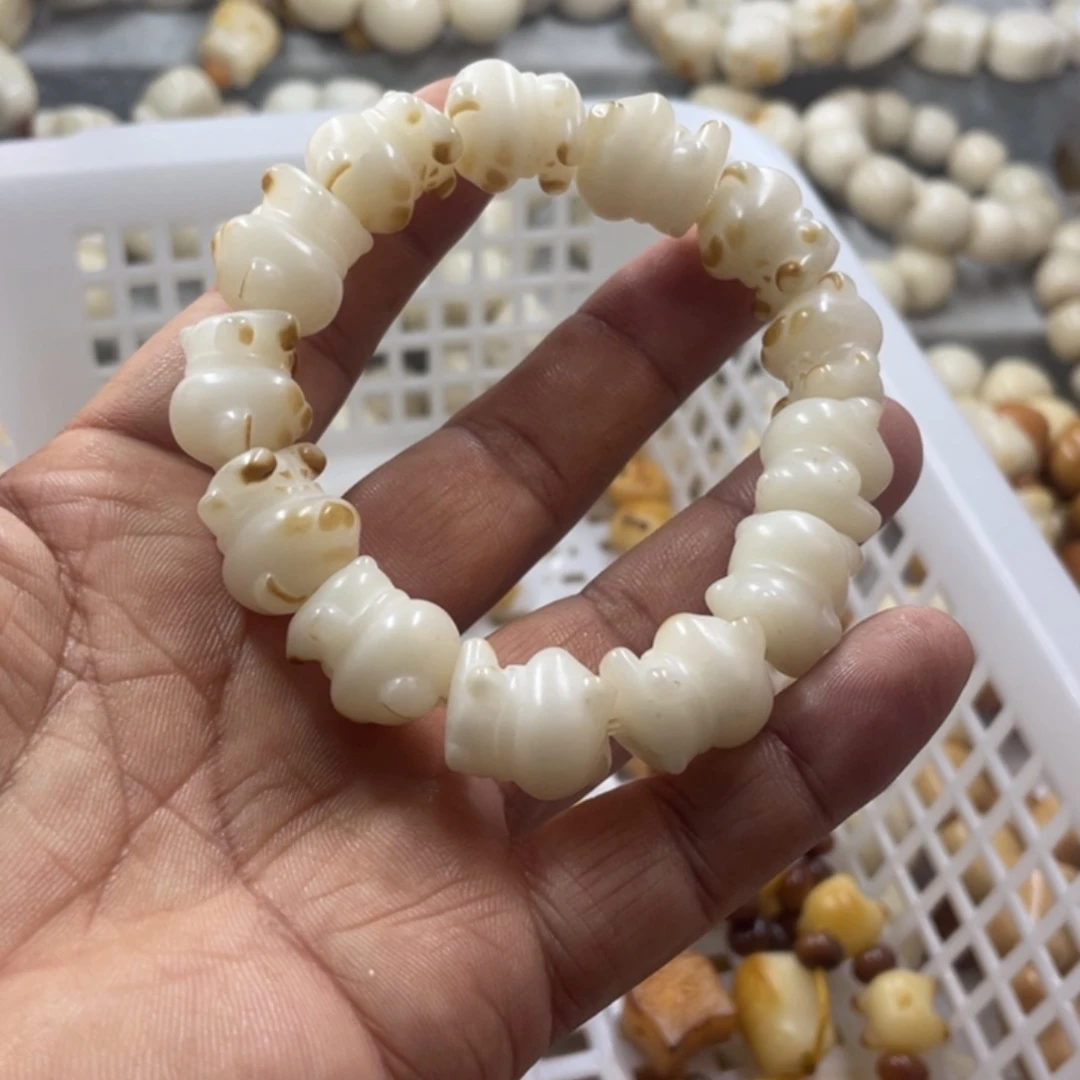 吊坠菩提根/象牙果微瑕小熊手串