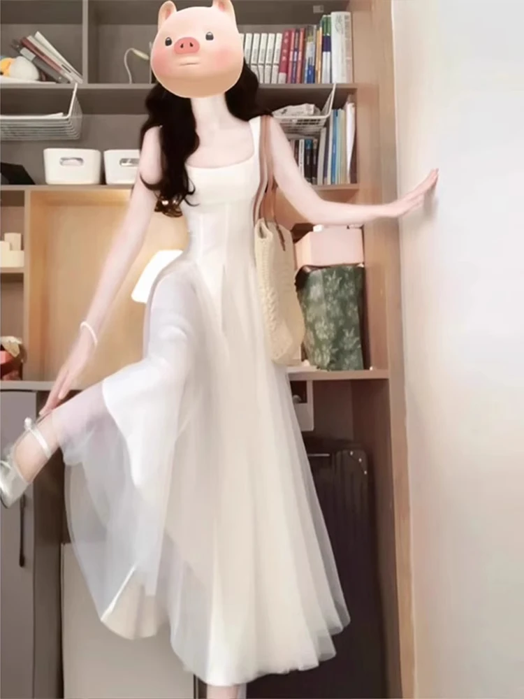 高级感蓬蓬网纱白色吊带连衣裙气质长裙夏日绝美小裙子约会仙女裙