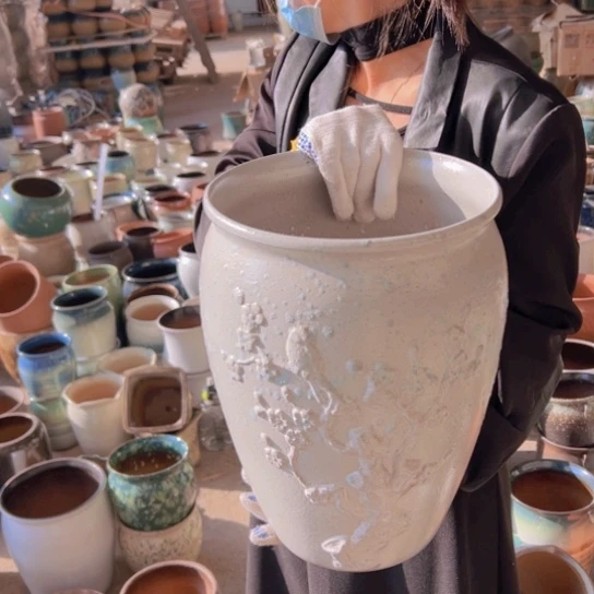 紫砂花盆高36口25。