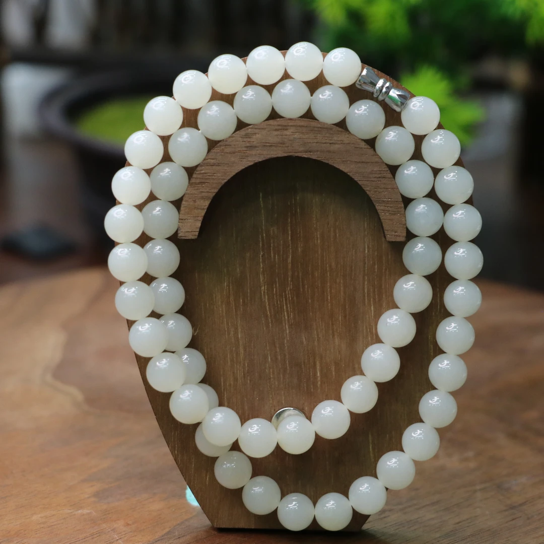 和田玉且末暖白珠链/171807保利山东拍卖