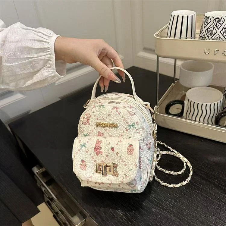 休闲学院可爱小兔蛋糕蝴蝶结碎花涂鸦双肩包开学网红ins菱格印花