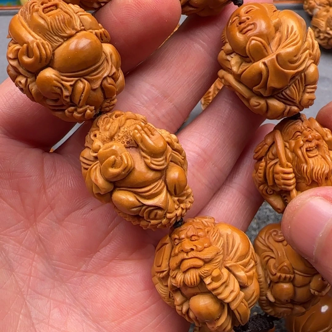 茕***宇吊坠橄榄核……………………