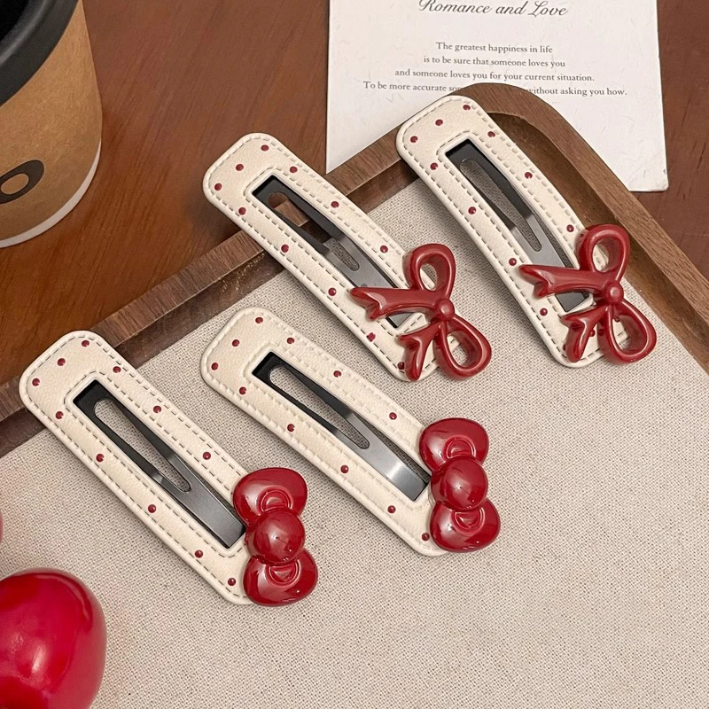 红蝴蝶结波点发夹 一对装