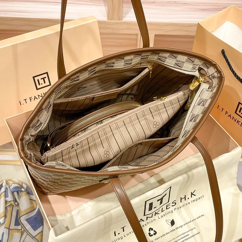 香港牛皮大容量托特包女2025新款春秋高级感真皮女包单肩子母大包