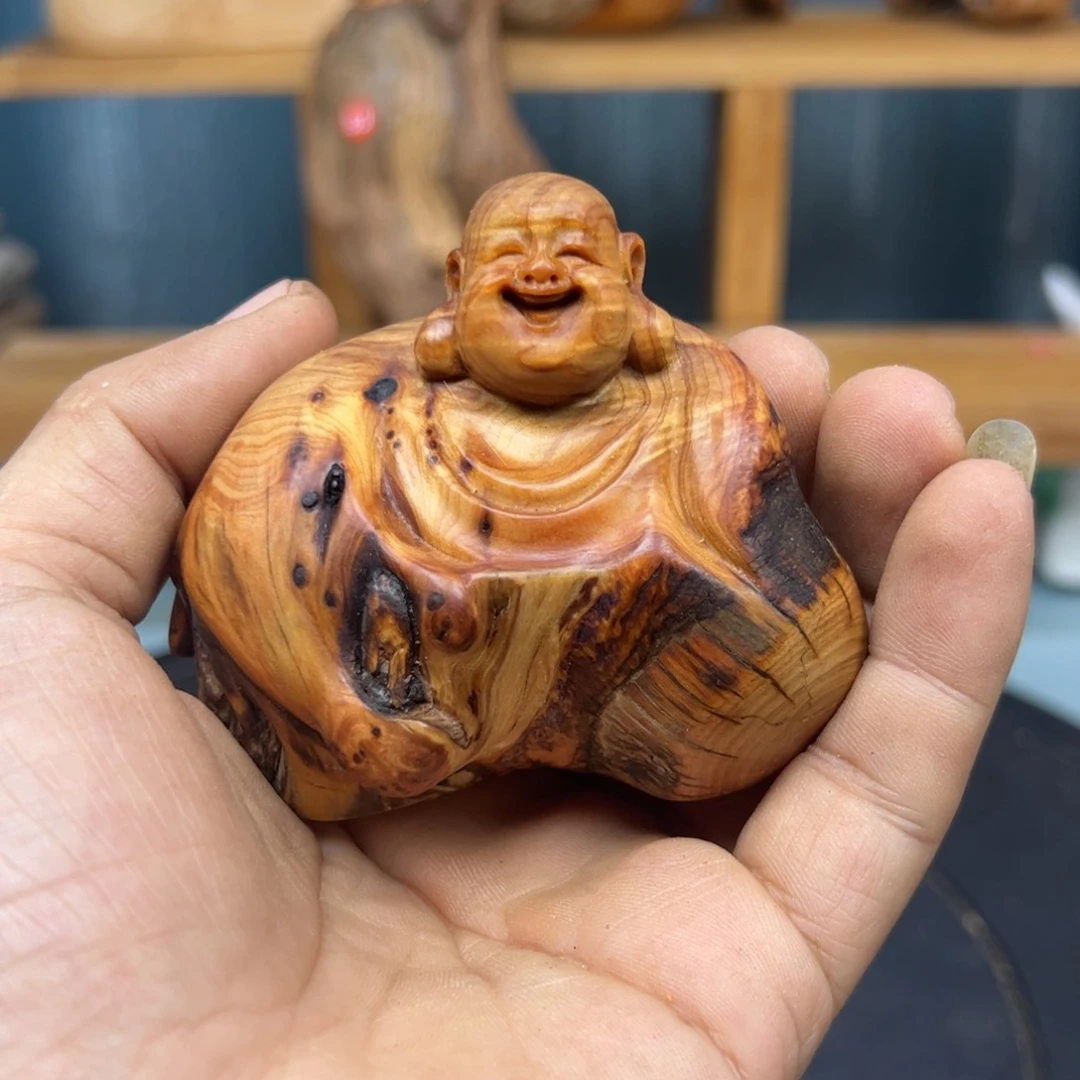木一****z崖柏木摆件手把件