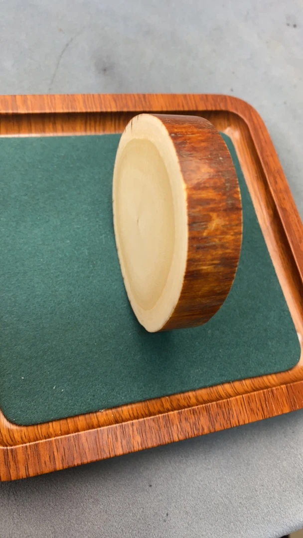 猛犸牙大红皮牙饼手把件