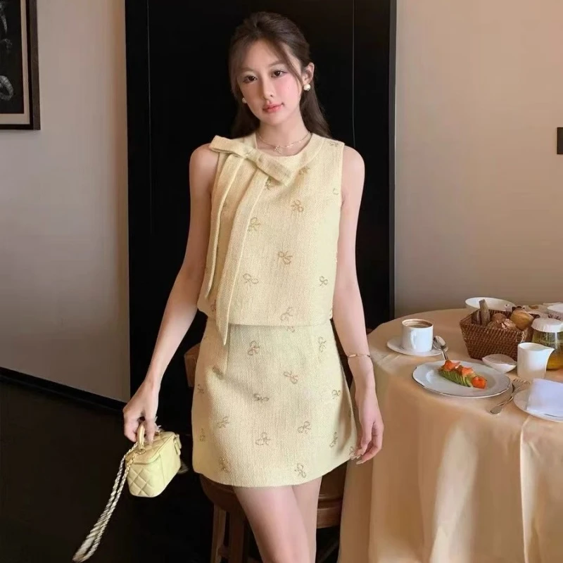 法式千金风穿搭一整套女装别致重工钉珠蝴蝶结无袖上衣小香风短裙