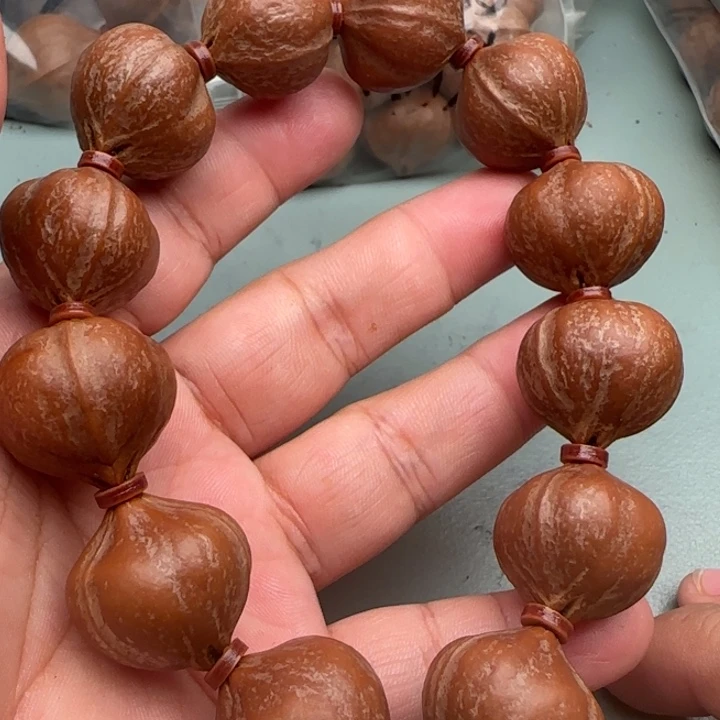 王***去橄榄核手串橄榄核原皮铁核