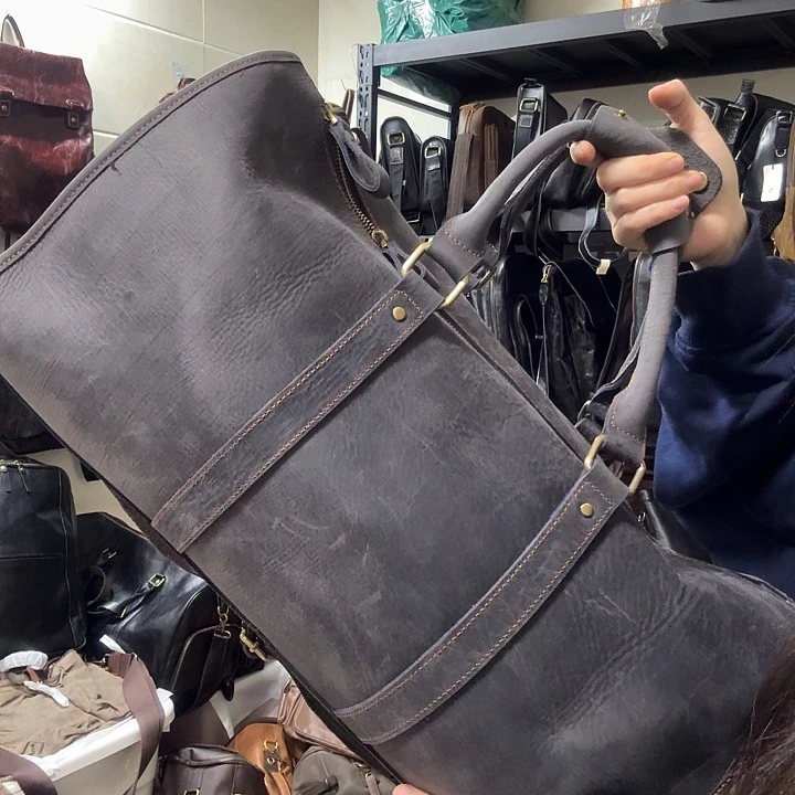 头层牛皮疯马皮蓝色旅行包