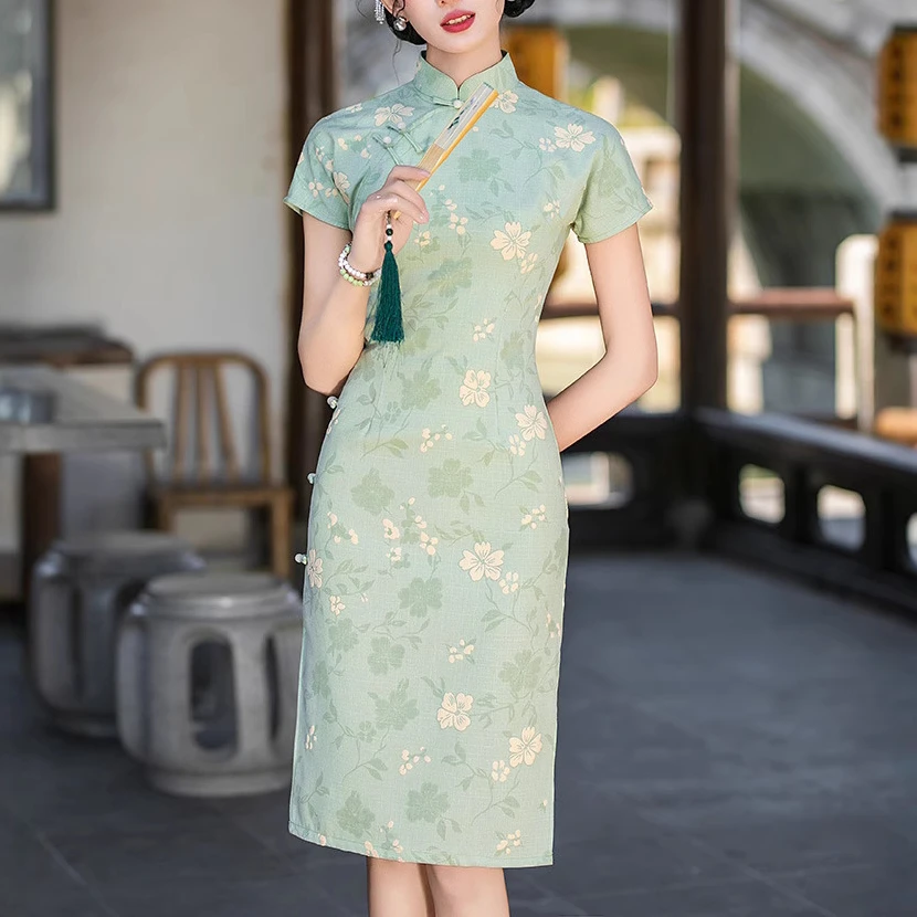 春夏款小清新日常文艺碎花时尚修身改良立领连肩袖中长年轻少女旗