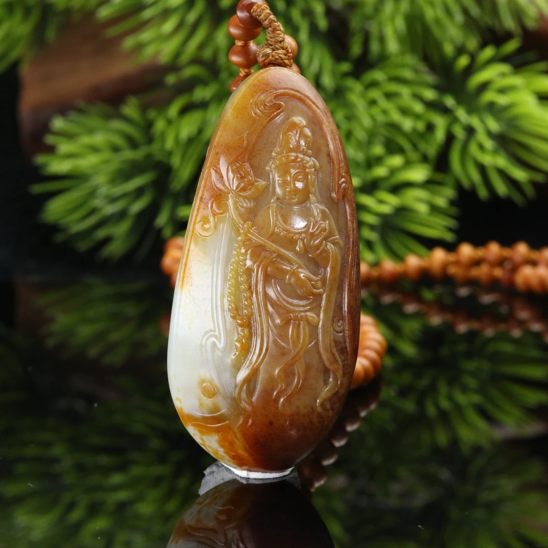 28和田玉红皮挂件（钟文杰）/201574北京中保拍卖