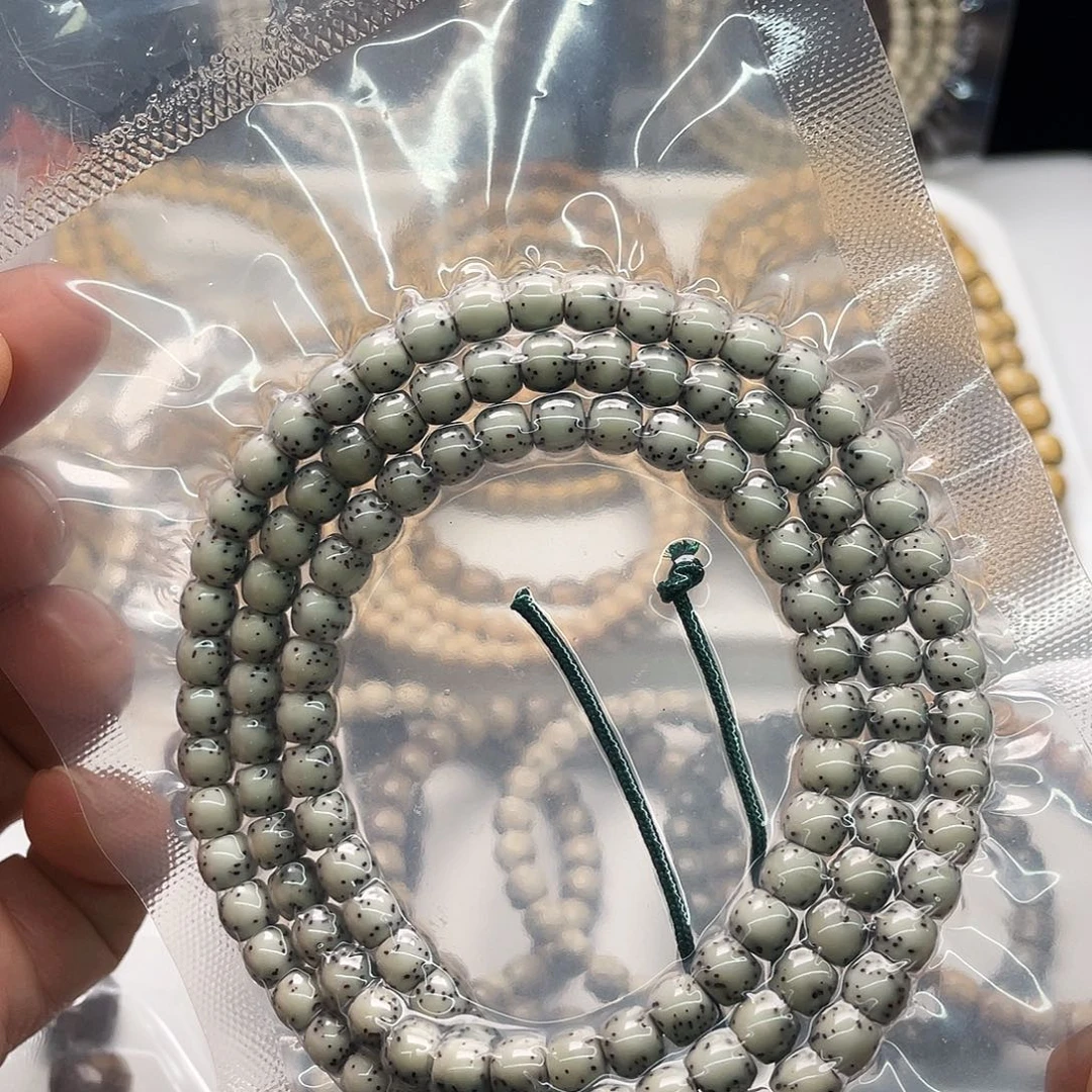 手串星月菩提同枝绿包白7x6鼓珠108