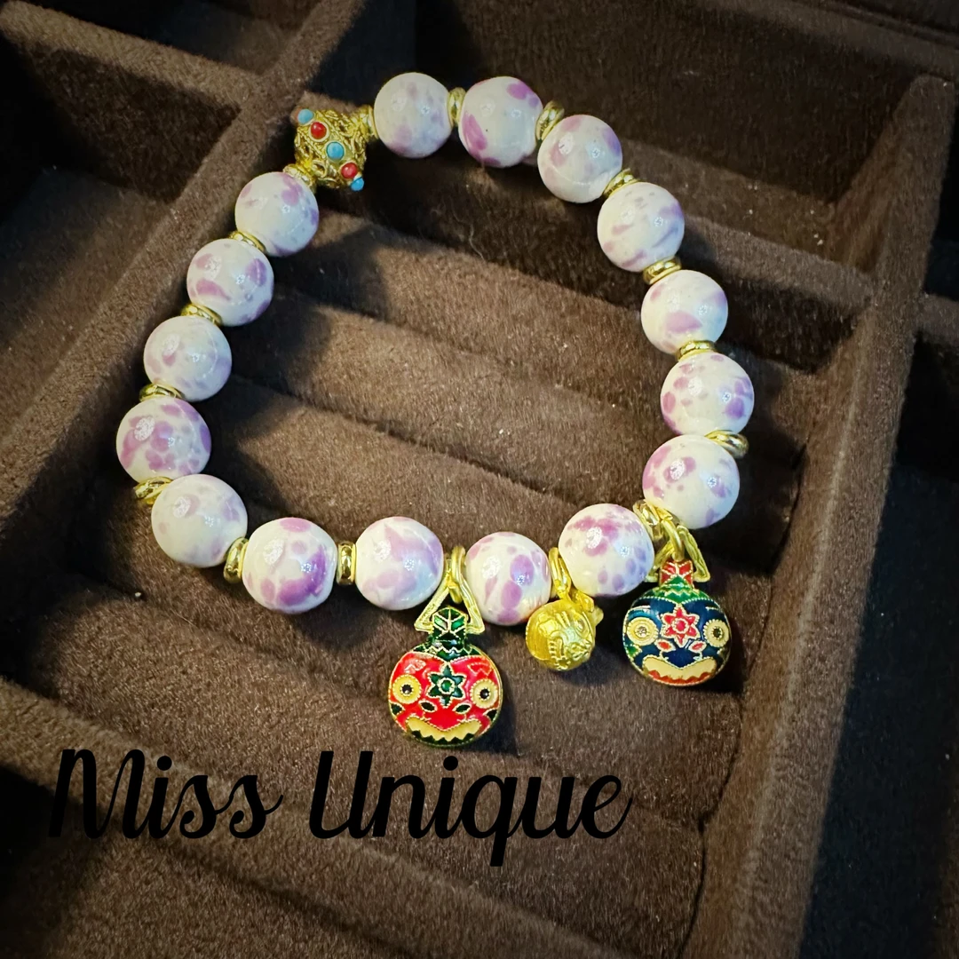 D5082紫色点点吸金兽手链