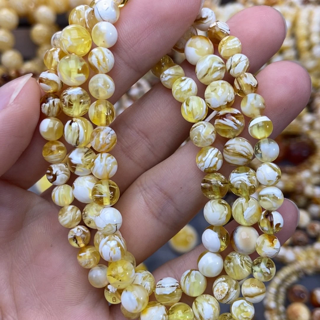 琥珀未镶嵌手链金漆白拉丝溶洞